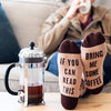 grappige sokken, bring me some coffee aan voeten op tafel | cadeauplek