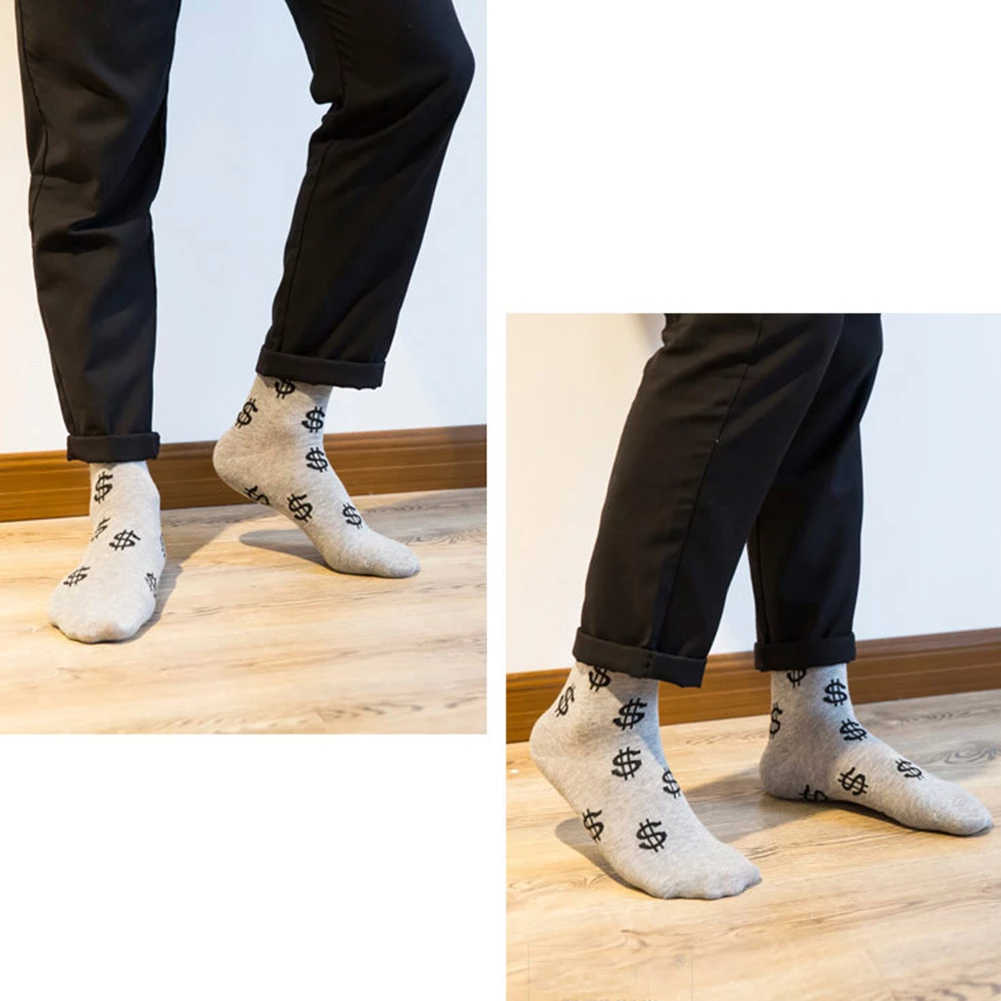 Grappige sokken met dollar tekens grijs aan voeten | cadeauplek