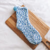 Fluffy huissokken licht blauw op plankje | Cadeauplek